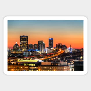 The Boston Skyline lit up blue at Sunset Sticker